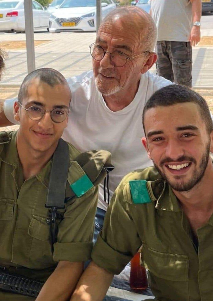 Shaked Dahan in uniform with family, smiling